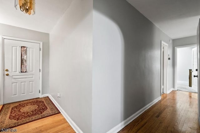 917 Tompkins Ave, South Plainfield Boro, NJ 07080 - foyer with hardwood / wood-style flooring and arched walkways