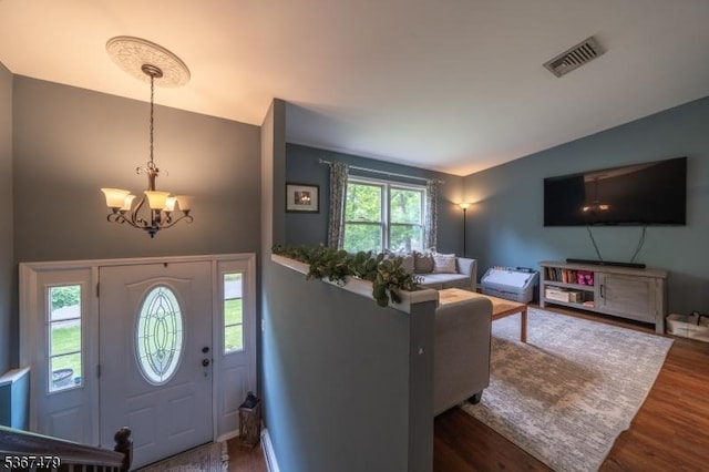 37 Evergreen Rd, Vernon Twp, NJ 07461 - foyer with a chandelier, wood finished floors, and lofted ceiling