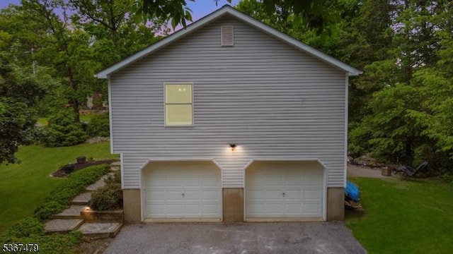 37 Evergreen Rd, Vernon Twp, NJ 07461 - view of side of home featuring a yard, an attached garage, and asphalt driveway