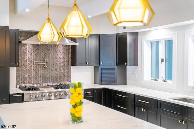 17 Glenwood Rd, Colts Neck Twp, NJ 07722 - kitchen with backsplash, light stone countertops, decorative light fixtures, and cooktop