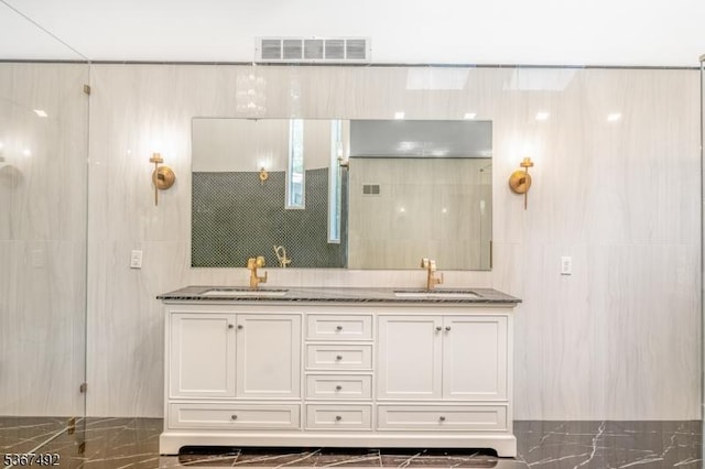 17 Glenwood Rd, Colts Neck Twp, NJ 07722 - full bathroom with double vanity, a shower, and tile walls