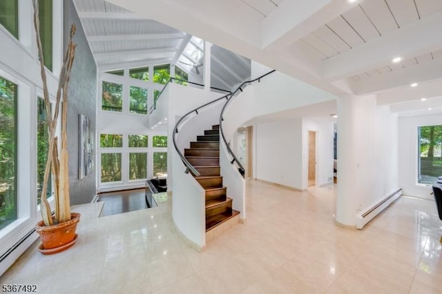 17 Glenwood Rd, Colts Neck Twp, NJ 07722 - entrance foyer featuring a baseboard radiator, beamed ceiling, a towering ceiling, and stairway