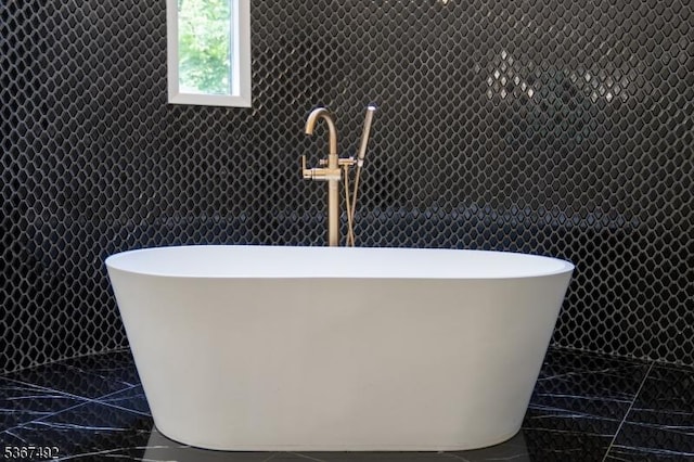 17 Glenwood Rd, Colts Neck Twp, NJ 07722 - bathroom featuring a freestanding bath and marble finish flooring