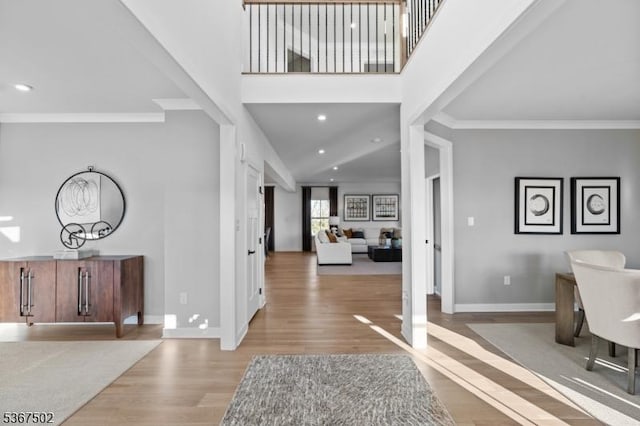 14 Glacier Way, Union Twp, NJ 08867 - entrance foyer featuring wood finished floors, ornamental molding, recessed lighting, and a towering ceiling