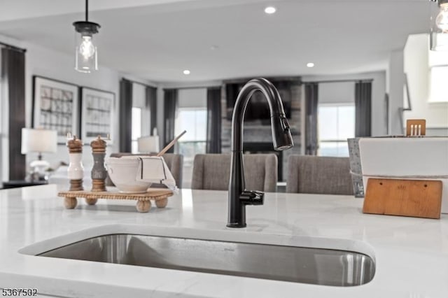 14 Glacier Way, Union Twp, NJ 08867 - kitchen view of light stone countertops, recessed lighting, and decorative light fixtures
