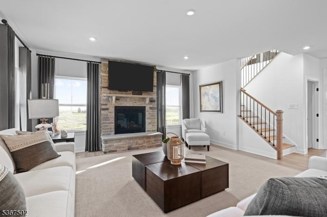 14 Glacier Way, Union Twp, NJ 08867 - living room with stairs, a stone fireplace, recessed lighting, and light wood-type flooring