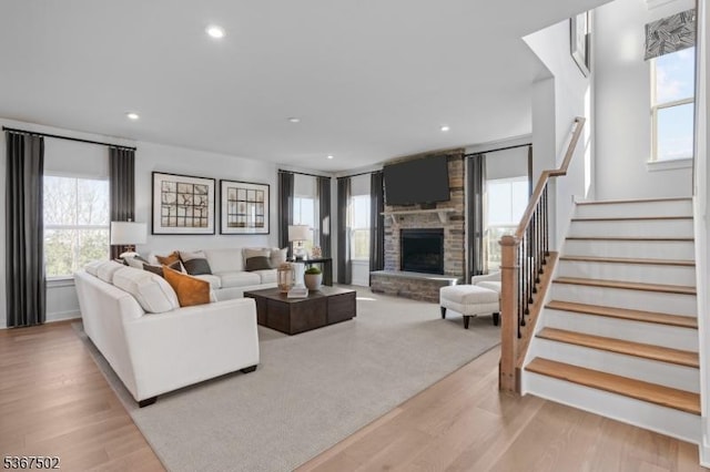 14 Glacier Way, Union Twp, NJ 08867 - living area featuring healthy amount of natural light, a stone fireplace, light wood-style flooring, and recessed lighting
