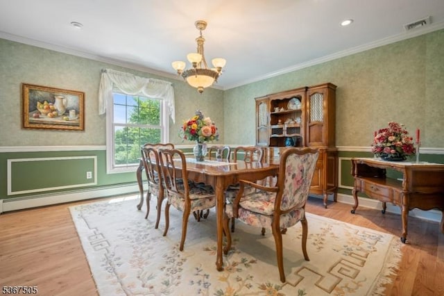 20 Scenic Dr, Fredon Twp, NJ 07860 - dining space featuring baseboard heating, a wainscoted wall, a chandelier, wood finished floors, and ornamental molding