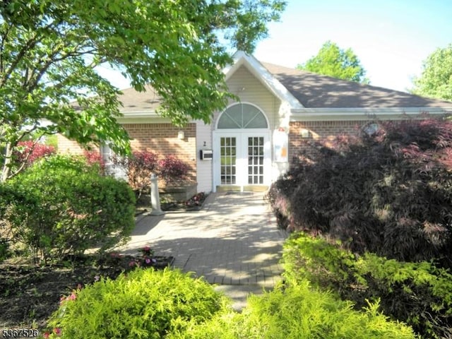 113 Lindsey Ct, Franklin Twp, NJ 08823 - property entrance featuring brick siding and french doors