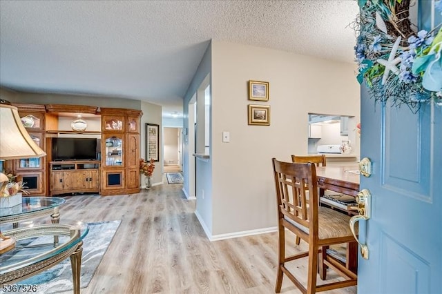 113 Lindsey Ct, Franklin Twp, NJ 08823 - living area with wood finished floors and a textured ceiling