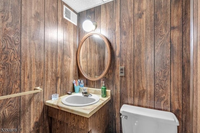 442 Stalevicz Ln, Rahway City, NJ 07065 - half bathroom with wood walls and vanity