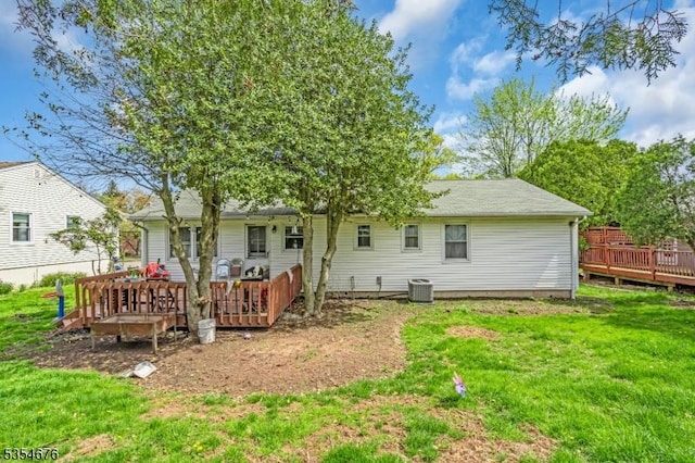 442 Stalevicz Ln, Rahway City, NJ 07065 - rear view of property with a wooden deck and a yard