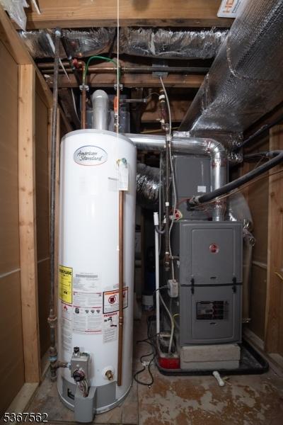216 S 5th Ave, Manville Boro, NJ 08835 - utility room featuring gas water heater