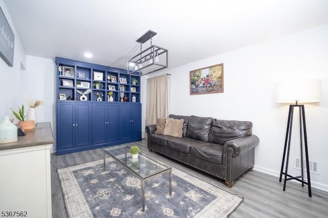 216 S 5th Ave, Manville Boro, NJ 08835 - living room with wood finished floors, a chandelier, and recessed lighting