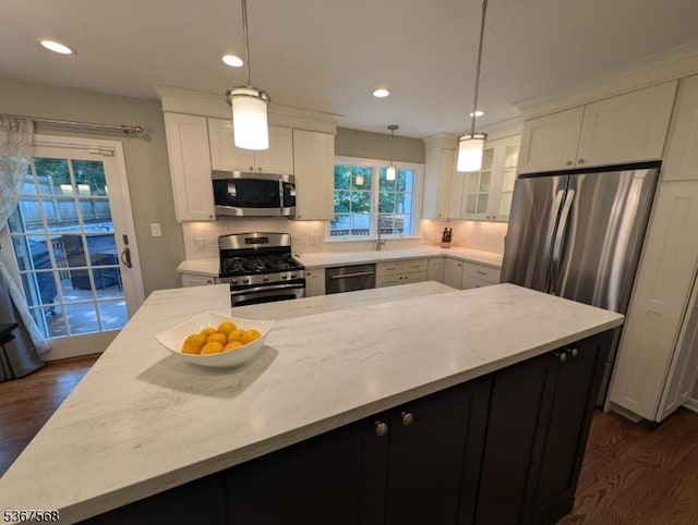 4 Parkway E, Caldwell Boro Twp, NJ 07006 - kitchen with stainless steel appliances, a center island, dark wood-type flooring, backsplash, and recessed lighting
