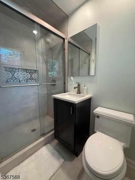 4 Parkway E, Caldwell Boro Twp, NJ 07006 - bathroom with vanity, a shower stall, and tile patterned floors