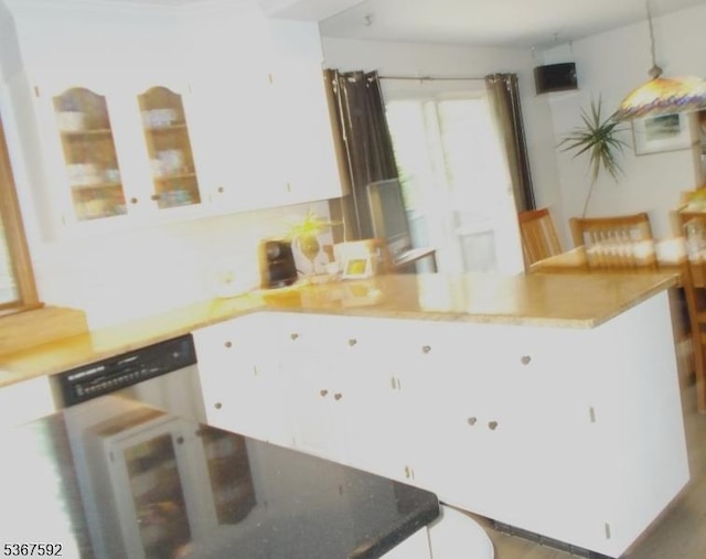 39 Stillwater Rd, Hardwick Twp, NJ 07825 - kitchen with a peninsula, white cabinets, and glass insert cabinets