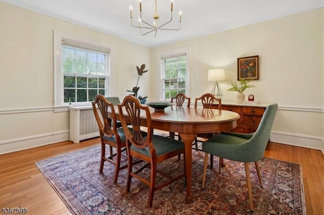 329 W End Rd, South Orange Village Twp, NJ 07079 - dining room with a chandelier, wood finished floors, and radiator heating unit