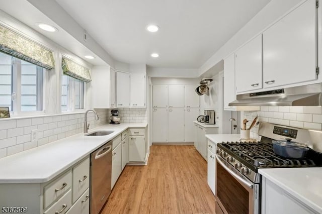 329 W End Rd, South Orange Village Twp, NJ 07079 - kitchen featuring stainless steel appliances, under cabinet range hood, tasteful backsplash, light countertops, and recessed lighting
