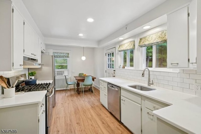 329 W End Rd, South Orange Village Twp, NJ 07079 - kitchen featuring stainless steel appliances, under cabinet range hood, recessed lighting, light countertops, and light wood-style floors