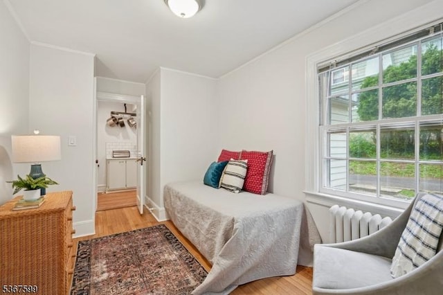 329 W End Rd, South Orange Village Twp, NJ 07079 - bedroom featuring radiator, wood finished floors, and crown molding