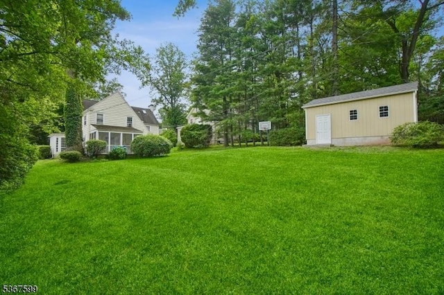 329 W End Rd, South Orange Village Twp, NJ 07079 - view of green lawn with an outdoor structure and a sunroom