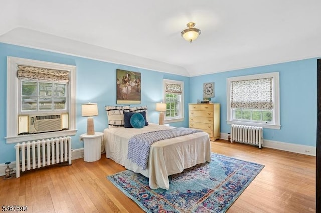 329 W End Rd, South Orange Village Twp, NJ 07079 - bedroom featuring radiator heating unit, cooling unit, and wood finished floors