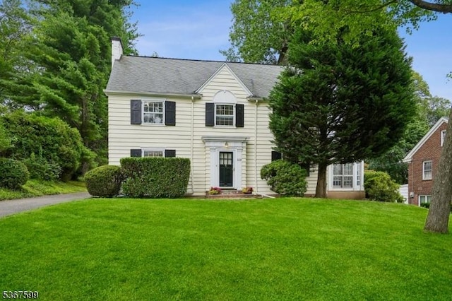 329 W End Rd, South Orange Village Twp, NJ 07079 - view of front of house featuring a front yard and a chimney