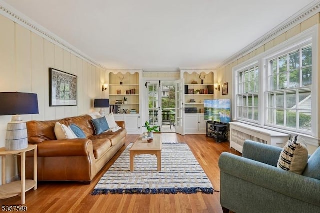 329 W End Rd, South Orange Village Twp, NJ 07079 - living area featuring radiator, wood finished floors, and crown molding