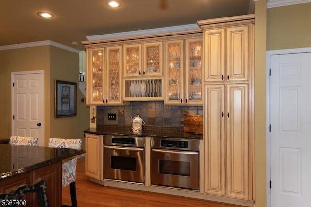 10 Links Ct, Sparta Twp, NJ 07871 - kitchen with oven, ornamental molding, dark stone countertops, backsplash, and recessed lighting