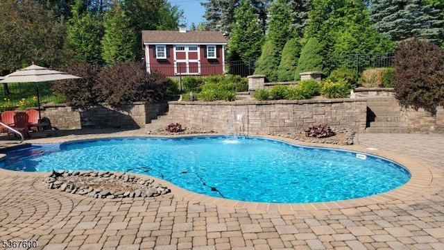 10 Links Ct, Sparta Twp, NJ 07871 - view of pool featuring an outdoor structure and a patio area