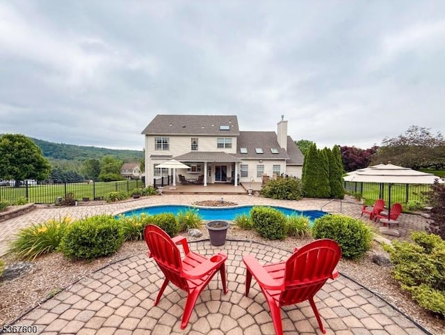 10 Links Ct, Sparta Twp, NJ 07871 - view of pool featuring a patio area, an outdoor fire pit, and a deck