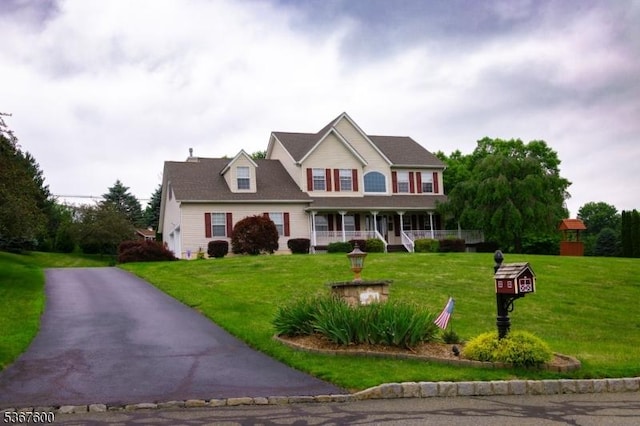 10 Links Ct, Sparta Twp, NJ 07871 - colonial home featuring a porch and a front lawn