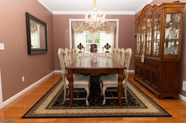 10 Links Ct, Sparta Twp, NJ 07871 - dining room with a chandelier, light wood finished floors, and crown molding