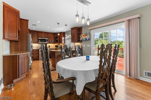 26 Ditmars Cir, Hillsborough Twp, NJ 08844 - dining space with light wood-type flooring and recessed lighting