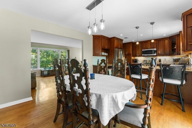 26 Ditmars Cir, Hillsborough Twp, NJ 08844 - dining room with light wood-style flooring and recessed lighting