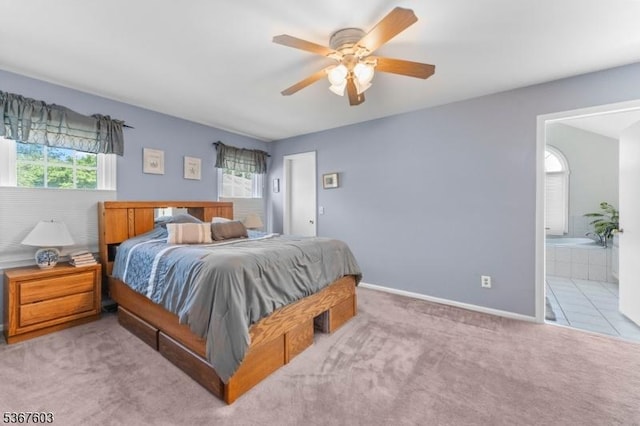 26 Ditmars Cir, Hillsborough Twp, NJ 08844 - bedroom with multiple windows, carpet, ensuite bath, and a ceiling fan