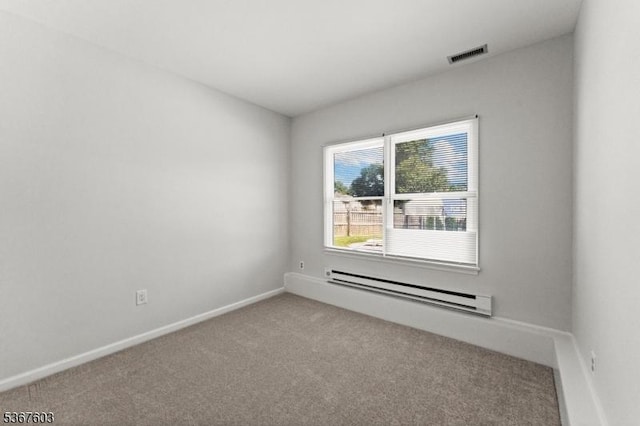 26 Ditmars Cir, Hillsborough Twp, NJ 08844 - carpeted spare room featuring a baseboard heating unit and baseboards