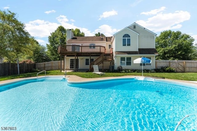 26 Ditmars Cir, Hillsborough Twp, NJ 08844 - view of swimming pool featuring stairway, a wooden deck, and a fenced backyard