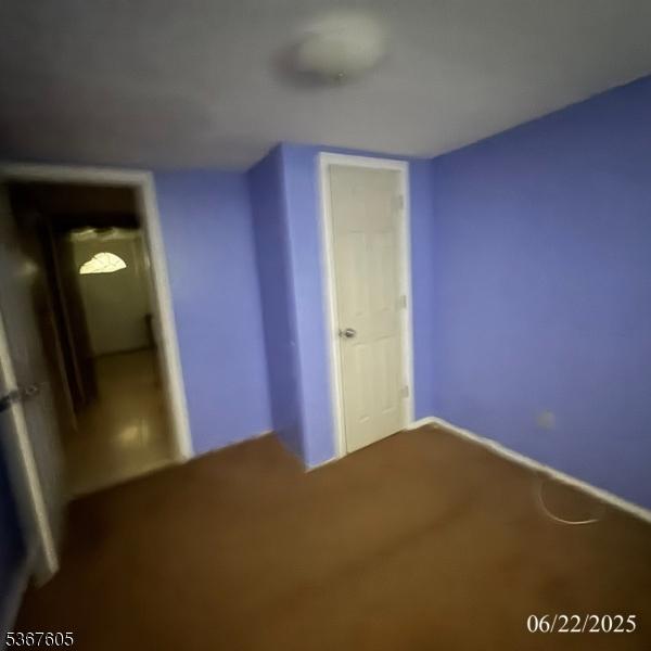 35 Eastern Pkwy, Hillside Twp, NJ 07205 - unfurnished bedroom featuring carpet floors and baseboards