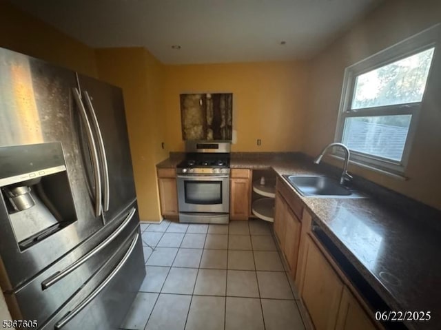 35 Eastern Pkwy, Hillside Twp, NJ 07205 - kitchen with stainless steel appliances and light tile patterned floors