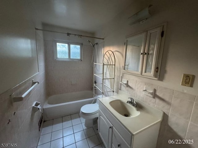 35 Eastern Pkwy, Hillside Twp, NJ 07205 - full bathroom featuring tile walls, vanity, bathing tub / shower combination, and tile patterned floors