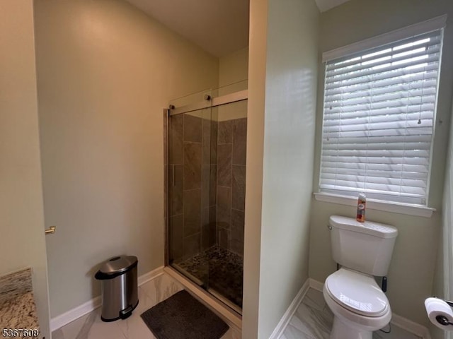 1002 Deerhaven Ter, Lopatcong Twp, NJ 08886 - bathroom with a stall shower, marble look tiles, and healthy amount of natural light