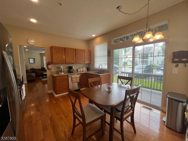 1002 Deerhaven Ter, Lopatcong Twp, NJ 08886 - dining space featuring hardwood / wood-style floors, a chandelier, and recessed lighting