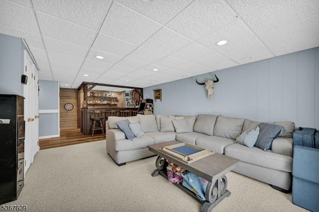 1508 County Rd 565, Vernon Twp, NJ 07461 - living area featuring a paneled ceiling, a bar, recessed lighting, carpet, and wooden walls