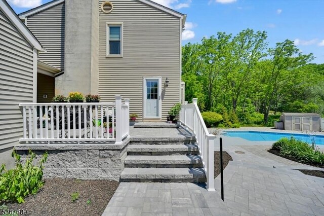 1508 County Rd 565, Vernon Twp, NJ 07461 - rear view of property featuring an outdoor pool and a patio