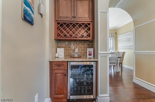 36 E Grant Ave, Roselle Park Boro, NJ 07204 - indoor dry bar featuring beverage cooler, tasteful backsplash, dark wood finished floors, and ornamental molding
