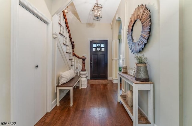 36 E Grant Ave, Roselle Park Boro, NJ 07204 - foyer entrance featuring dark wood-style floors, stairs, and a chandelier