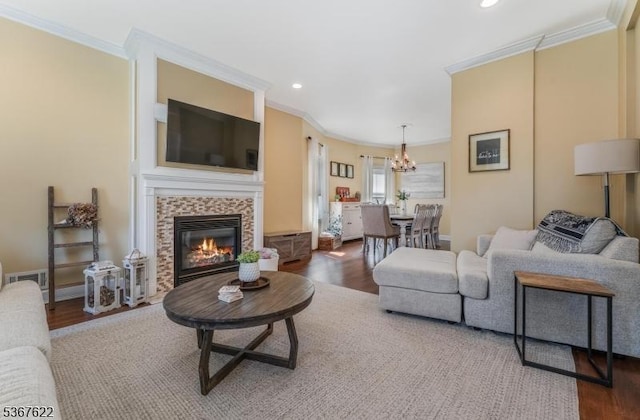 36 E Grant Ave, Roselle Park Boro, NJ 07204 - living room featuring ornamental molding, a chandelier, wood finished floors, a fireplace, and recessed lighting