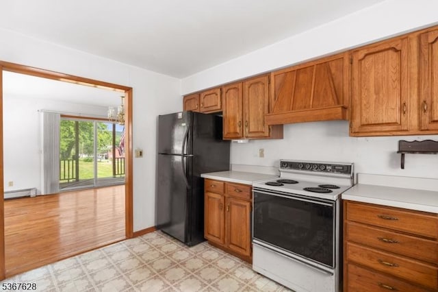 150 Buckley Ave, Oxford Twp, NJ 07863 - kitchen with white range with electric cooktop, freestanding refrigerator, light flooring, custom exhaust hood, and a baseboard radiator